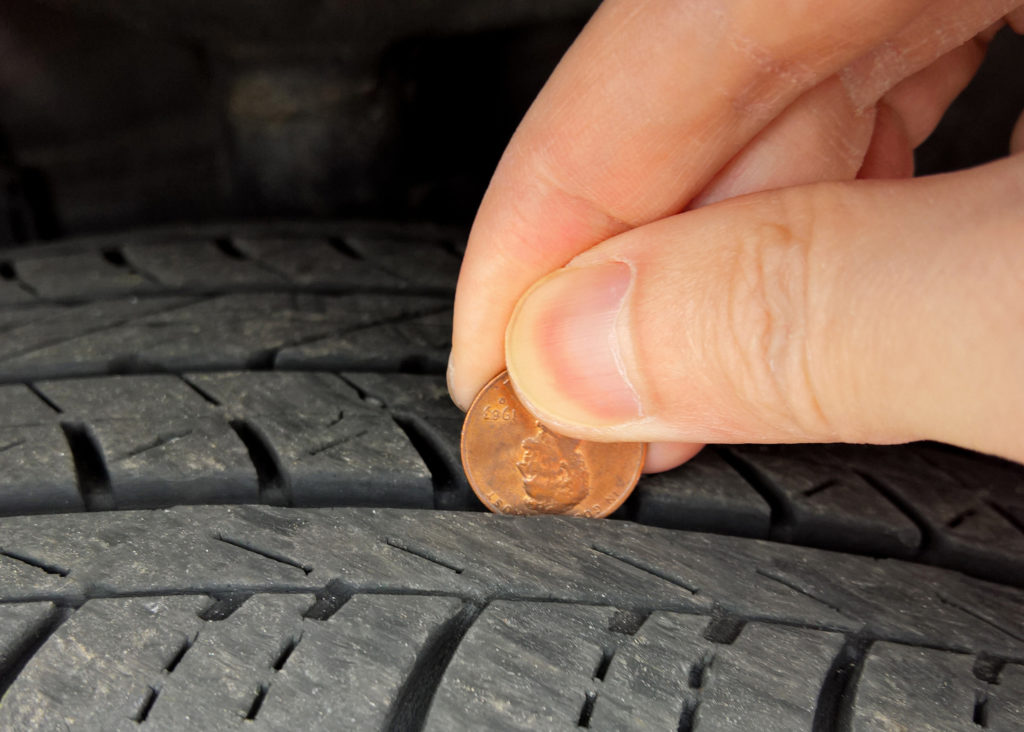 check tire tread with penny