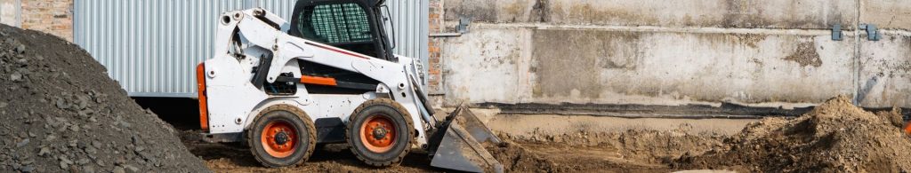 skid steer moving dirt