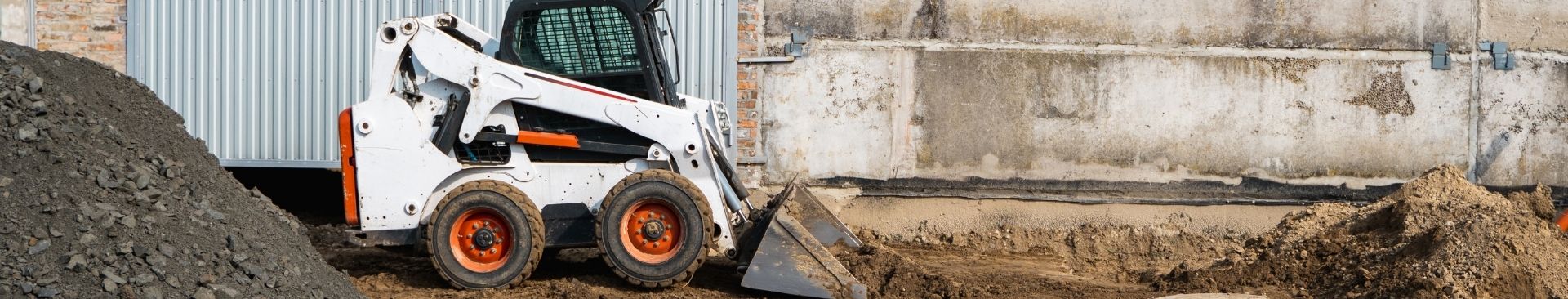 skid steer moving dirt