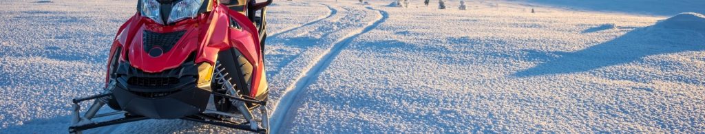 snowmobile on trail banner