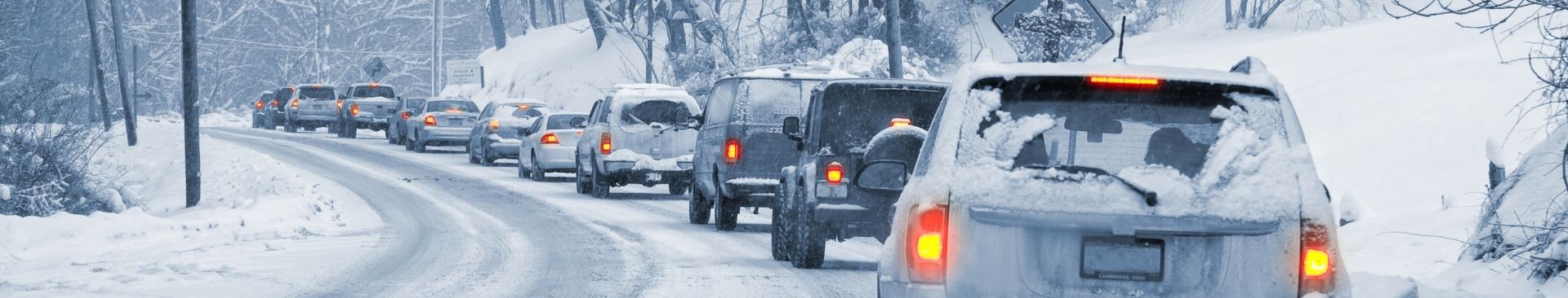 cars on snow covered road