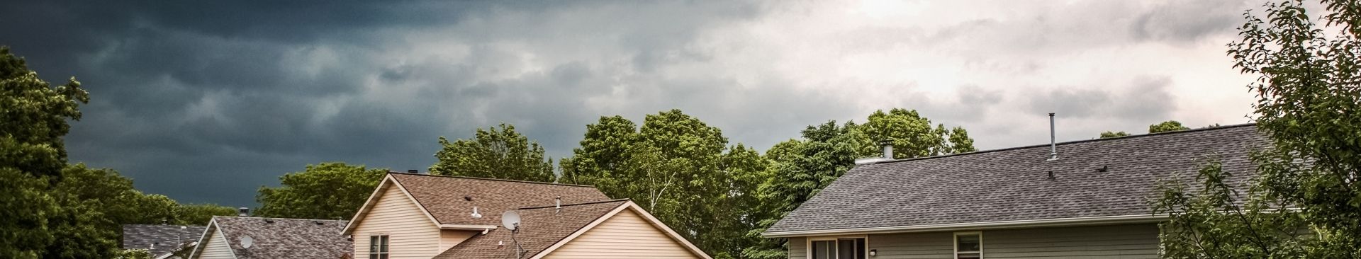 dark clouds over neighborhood