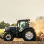 tractor plowing field
