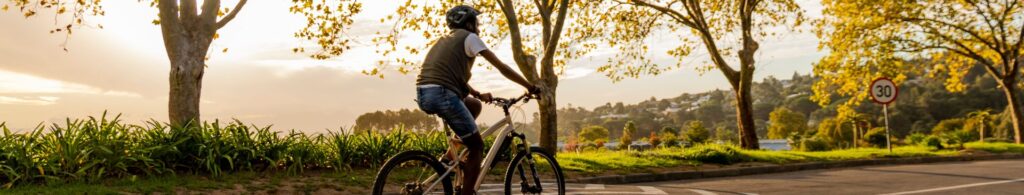 man riding bike on the road